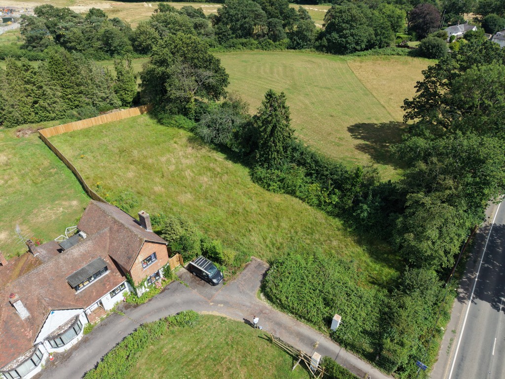 Lot: 53 - BUILDING PLOT WITH PLANNING FOR FOUR DWELLINGS - Hollytree plot from drone 1